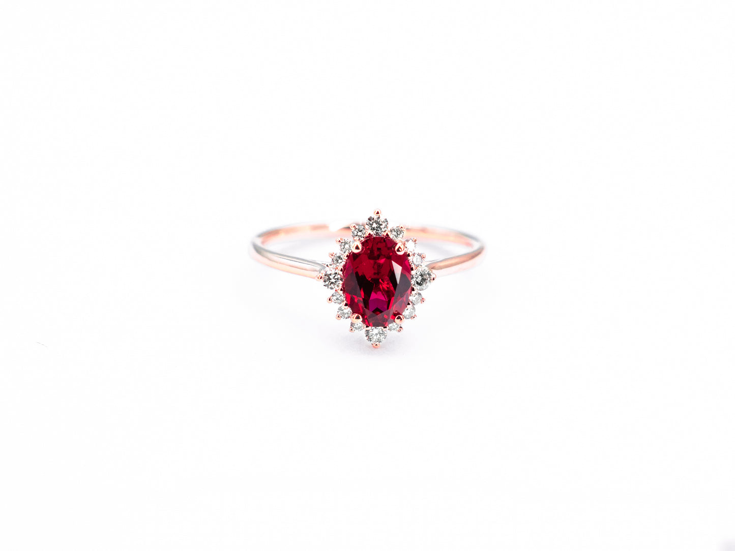 Vintage oval ruby and diamond rose gold ring, front view