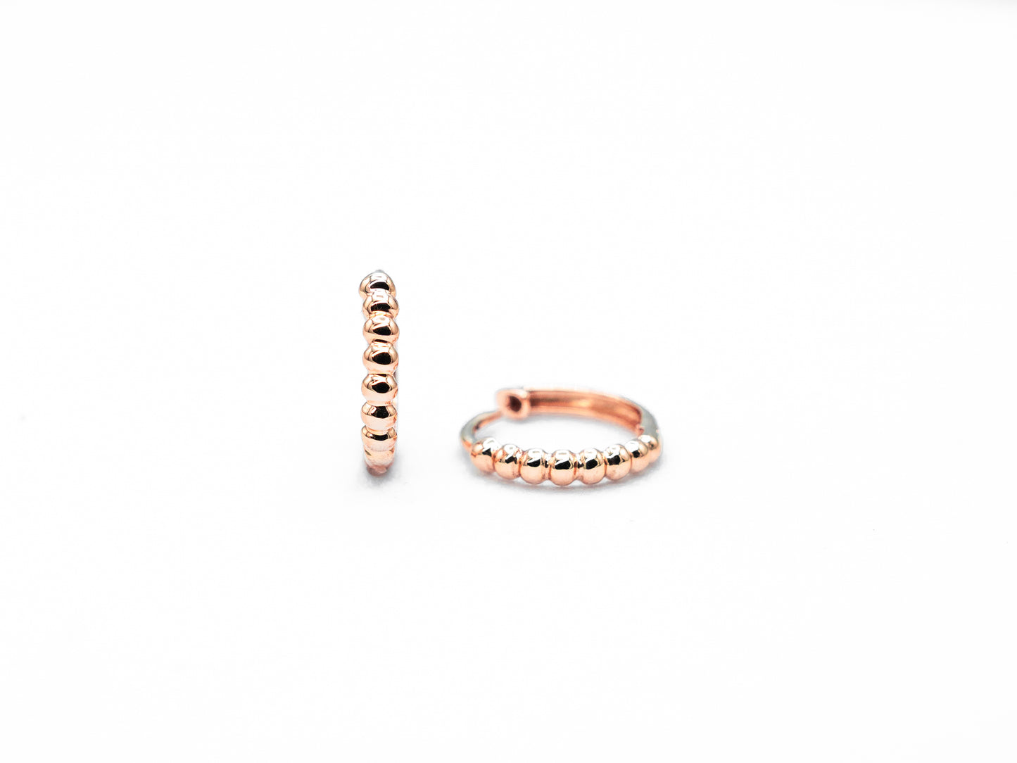 rose gold, beaded hoop earrings front and side view