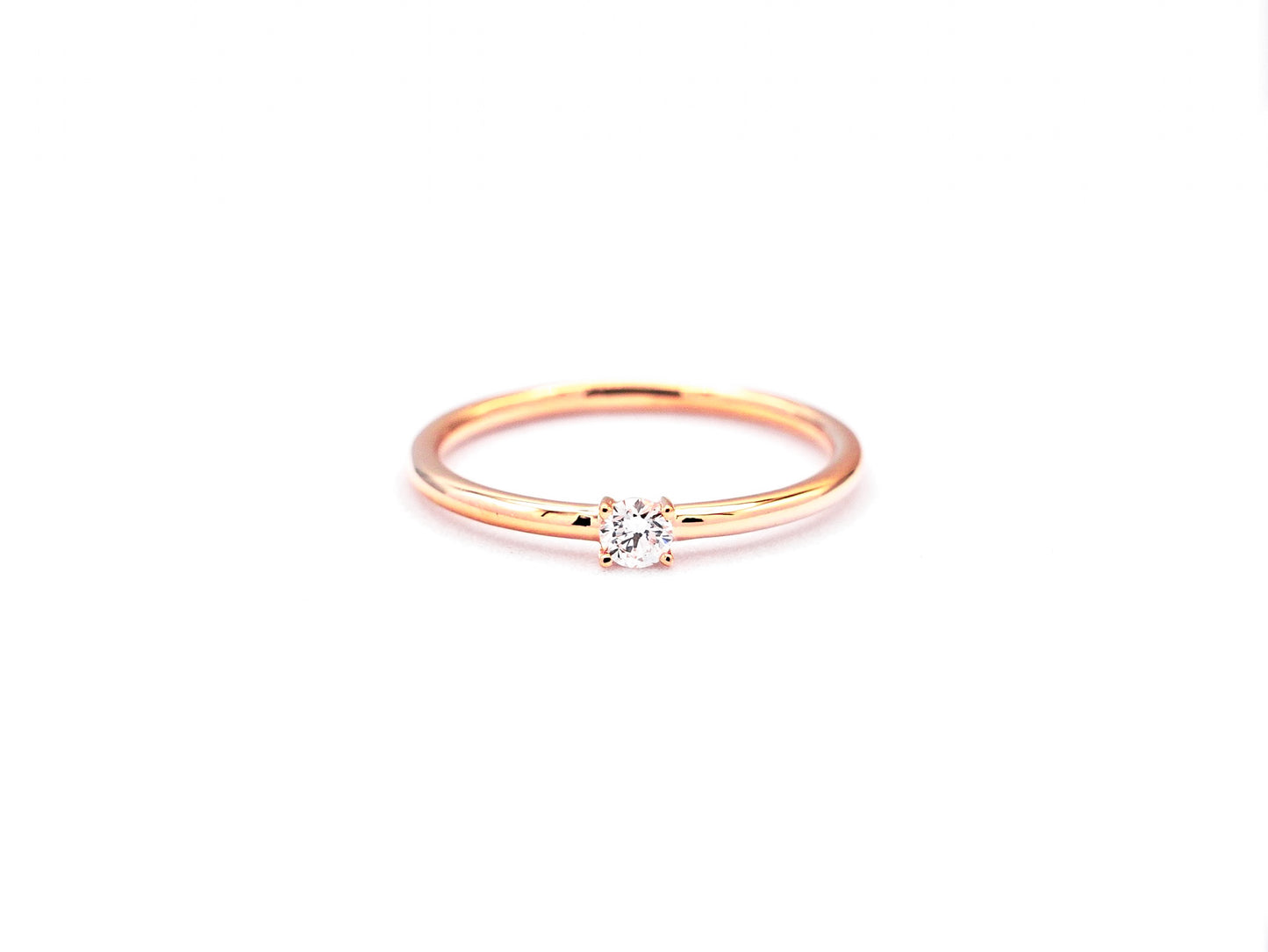 14k rose gold, solitaire lab diamond ring worn on hand, front view