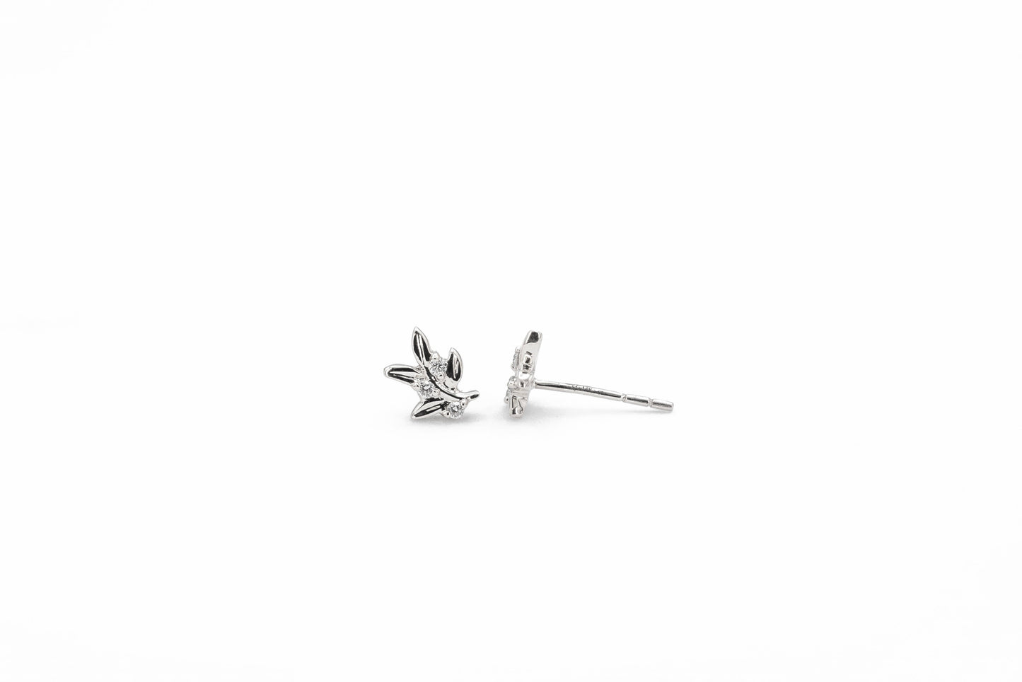 white gold leaf shaped diamond stud earrings, front and side view