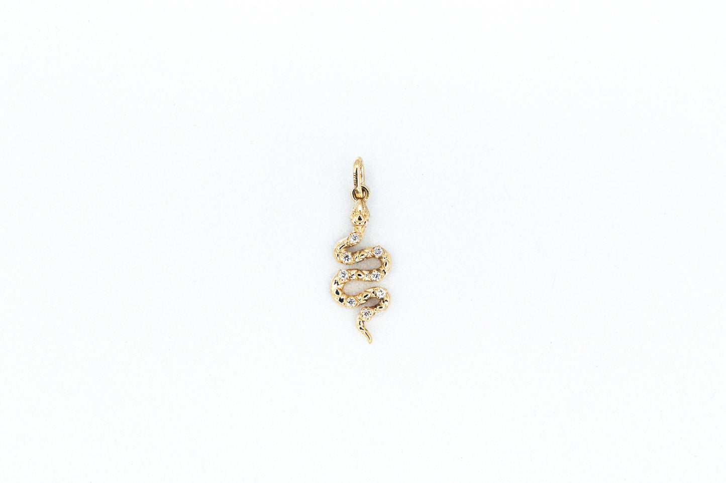 Solid yellow gold diamond snake pendant front view