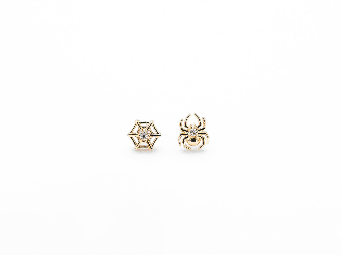 Yellow gold spider and spider web diamond stud earrings, front view
