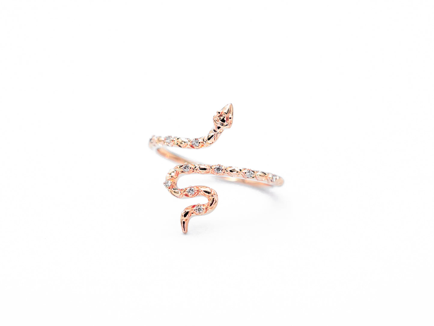 Snake shaped rose gold diamond ring, top view