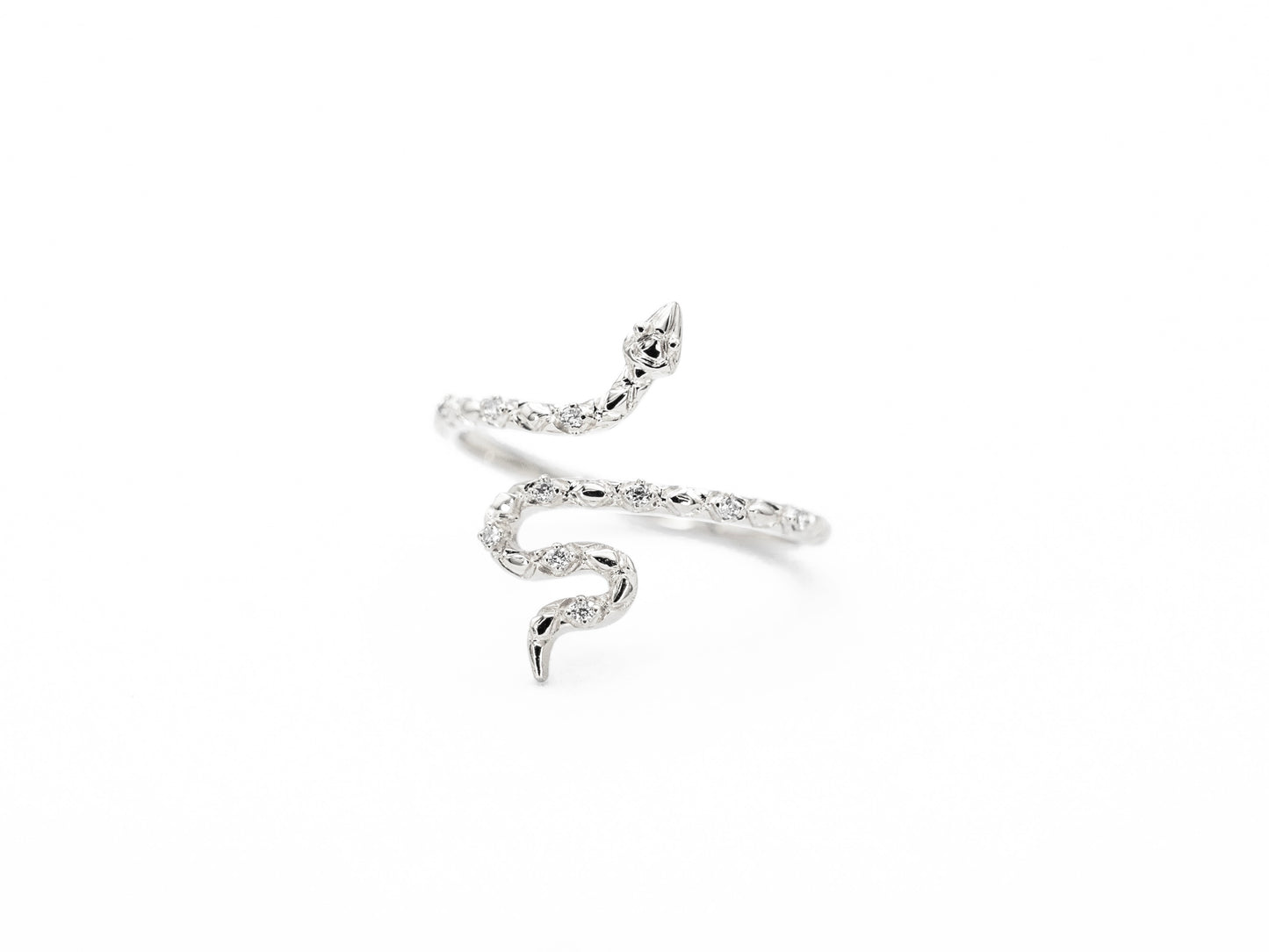 Snake shaped white gold diamond ring, top view