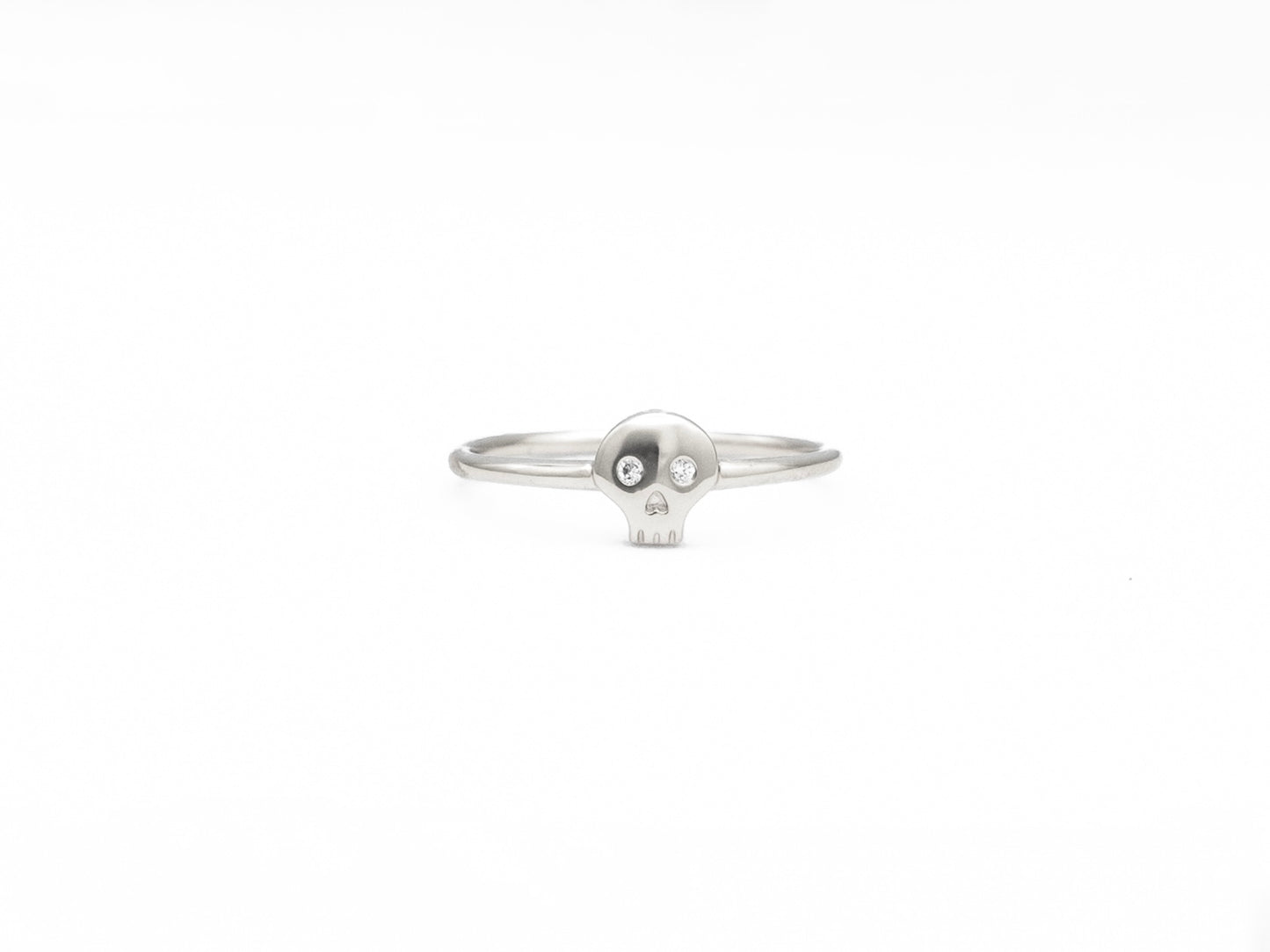 White gold diamond skull ring, front view