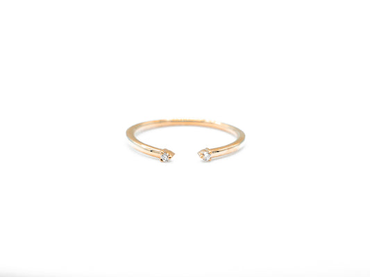 Yellow gold cuff ring with diamond accents, front view