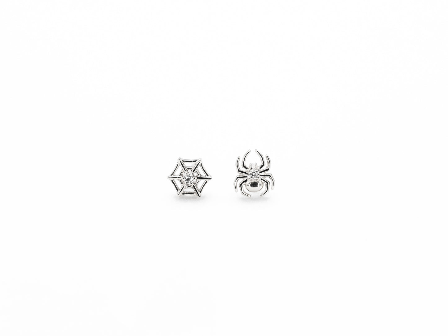 White gold spider and spider web diamond stud earrings, front view