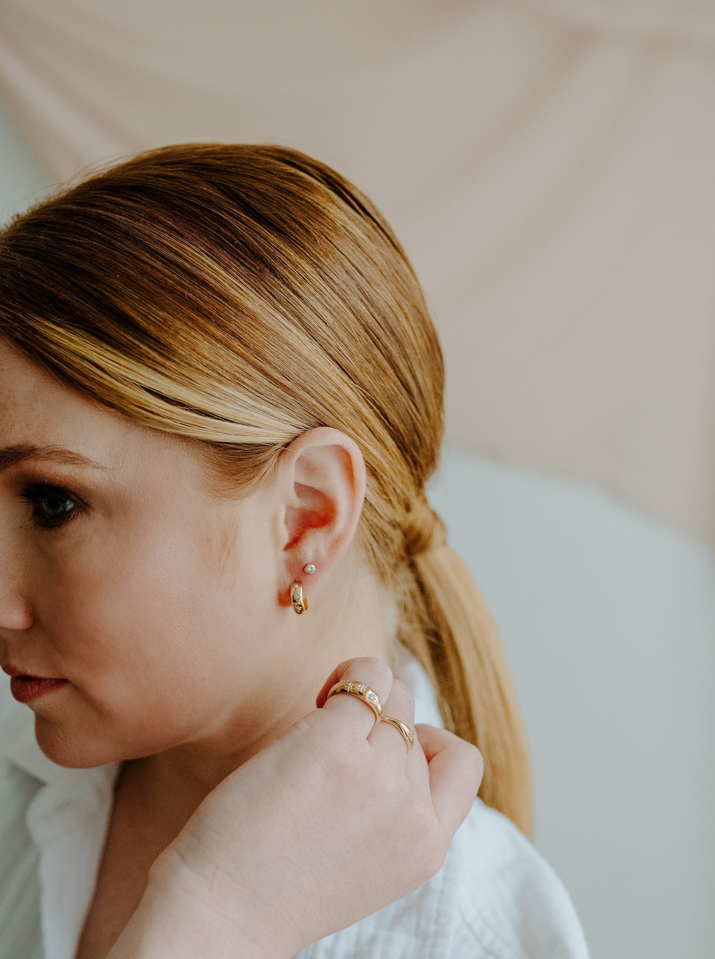 14k yellow gold, stud earrings, lab diamond, bezel, front and side view, worn on ear
