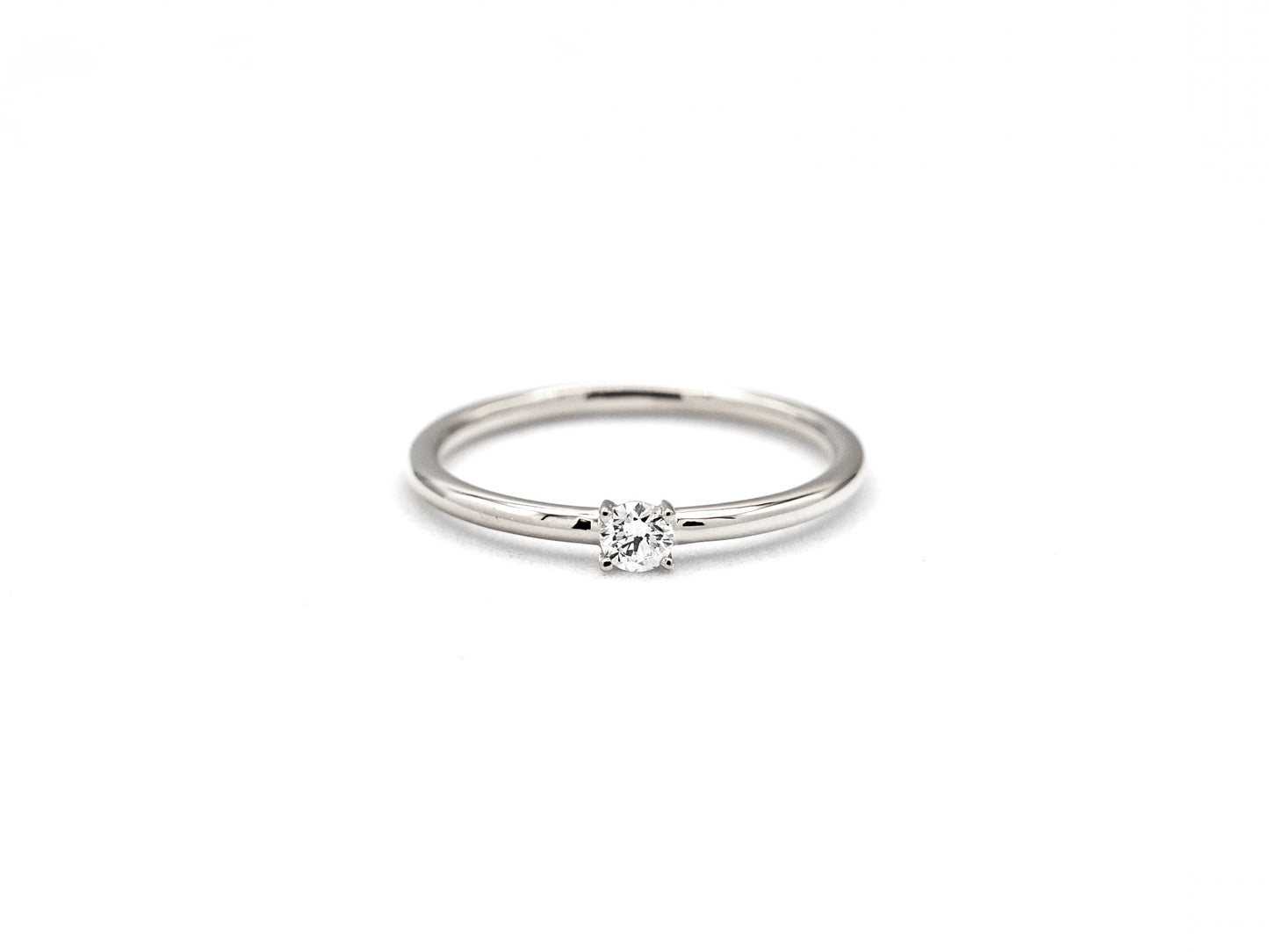 14k white gold, solitaire lab diamond ring worn on hand, front view