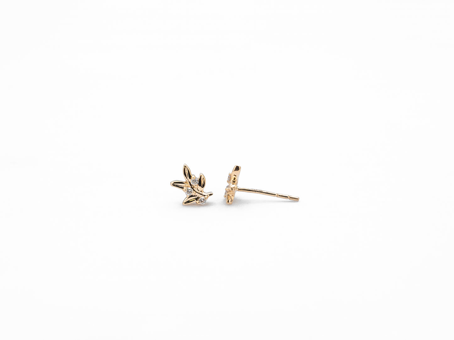 yellow gold leaf shaped diamond stud earrings, front and side view