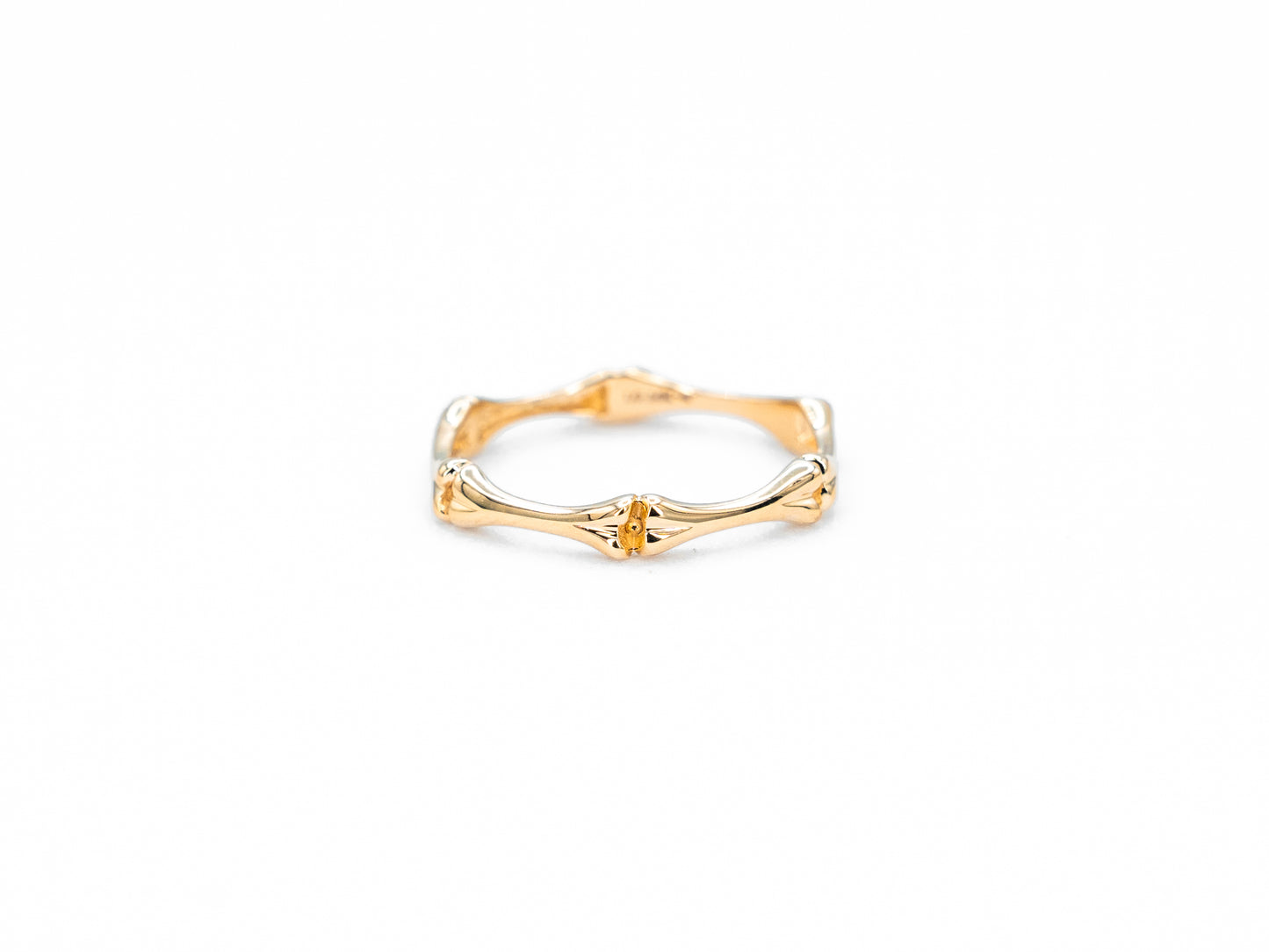 yellow gold bone shaped ring, front view