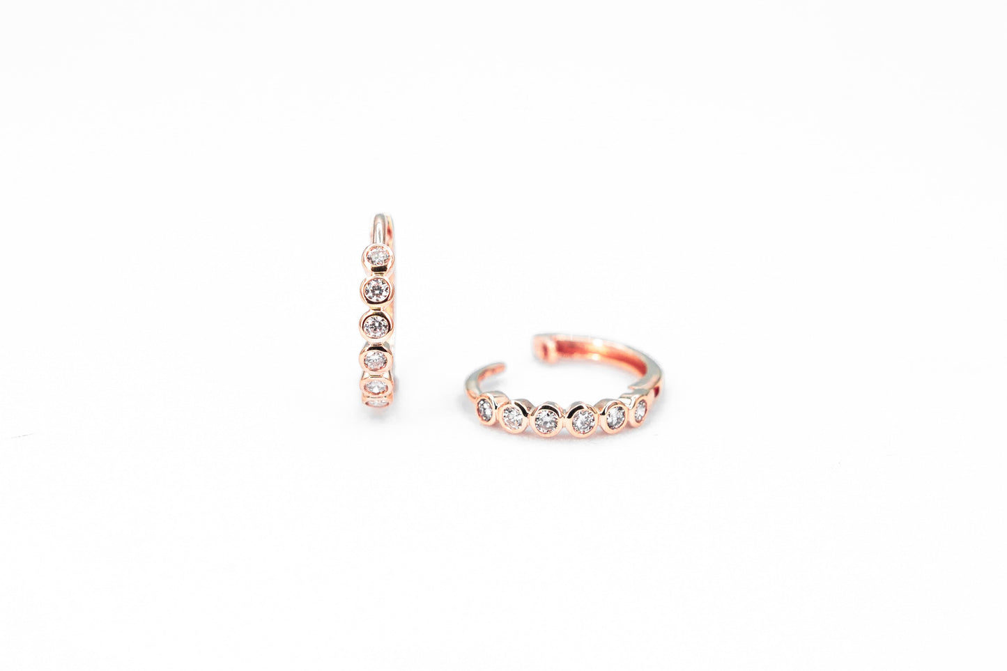 rose gold, diamond bezel set hoop earrings, front and side view