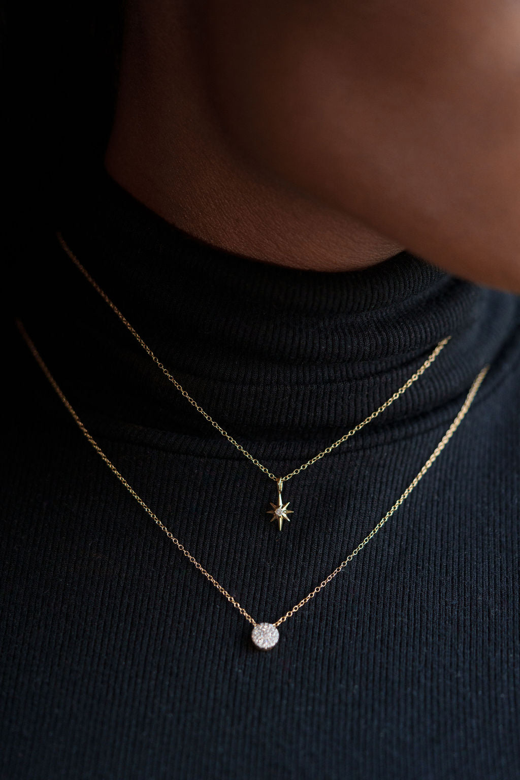 14k yellow gold, North Star lab diamond pendant being worn on neck, front view