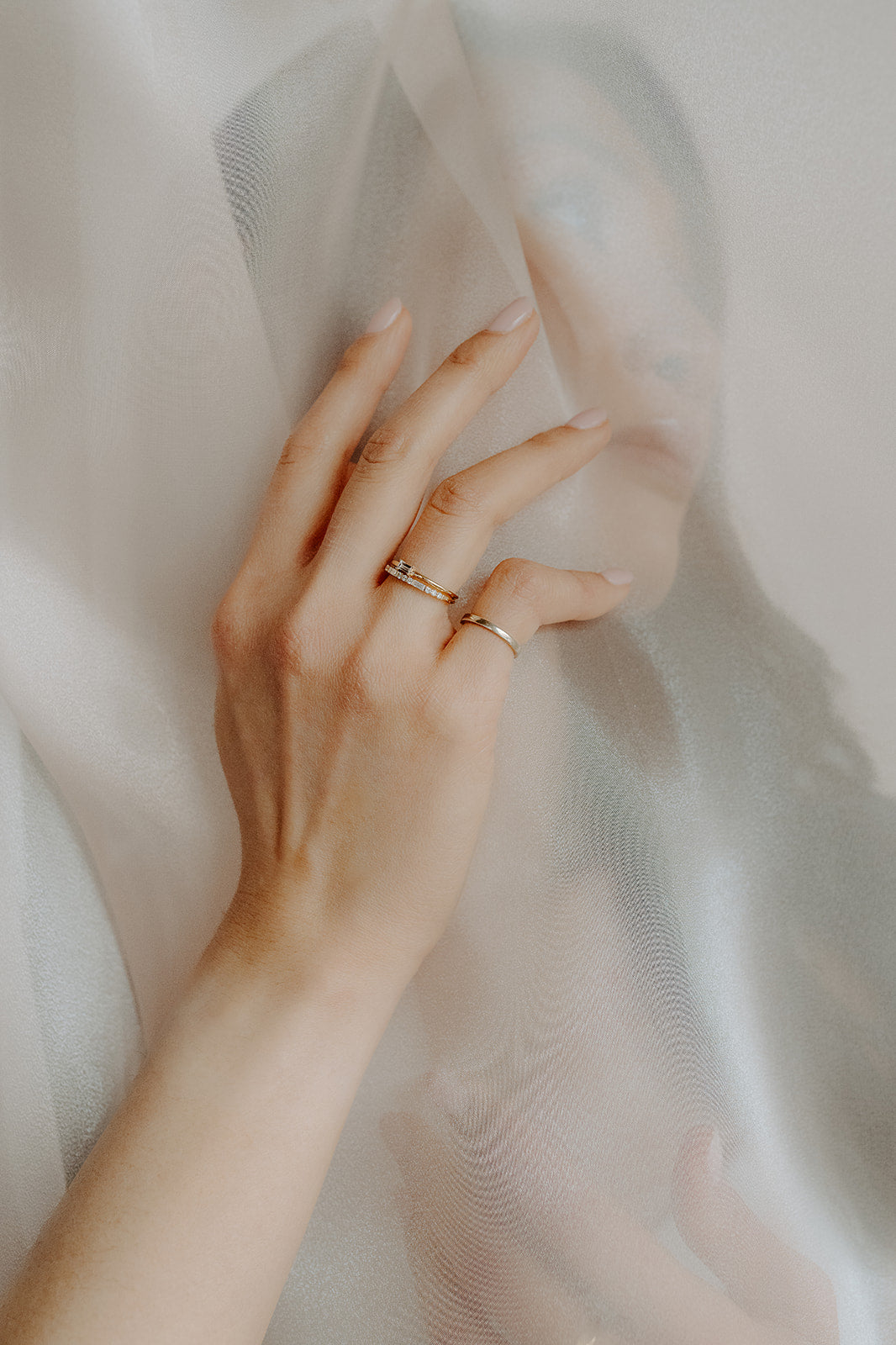 14k yellow gold, baguette and round lab diamond ring worn on hand, side view