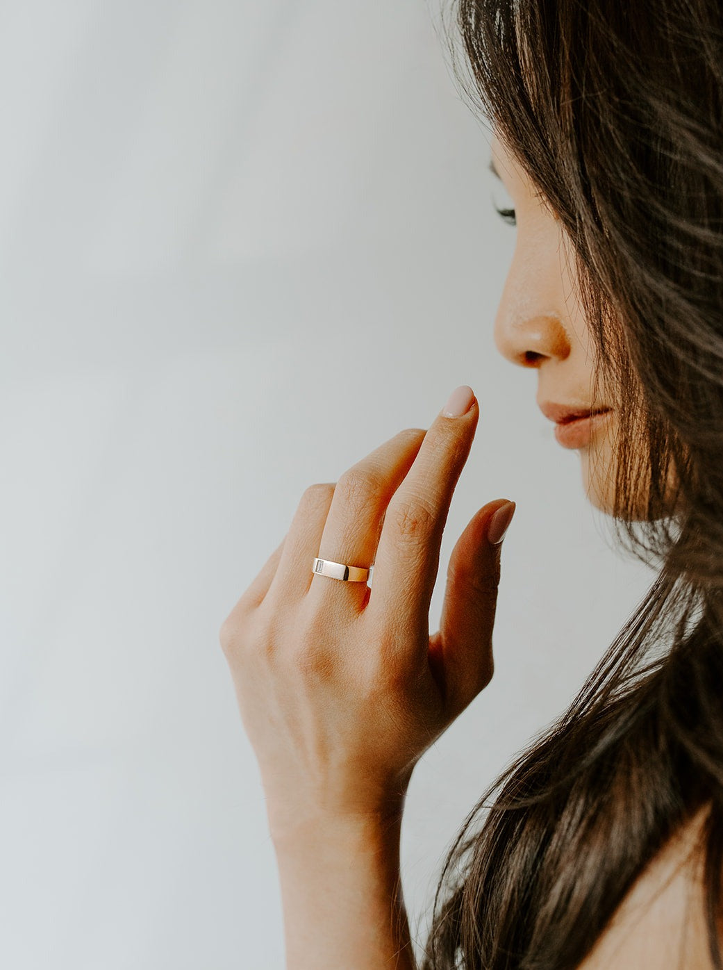 14k yellow gold, baguette diamond, bold ring worn on hand, side view