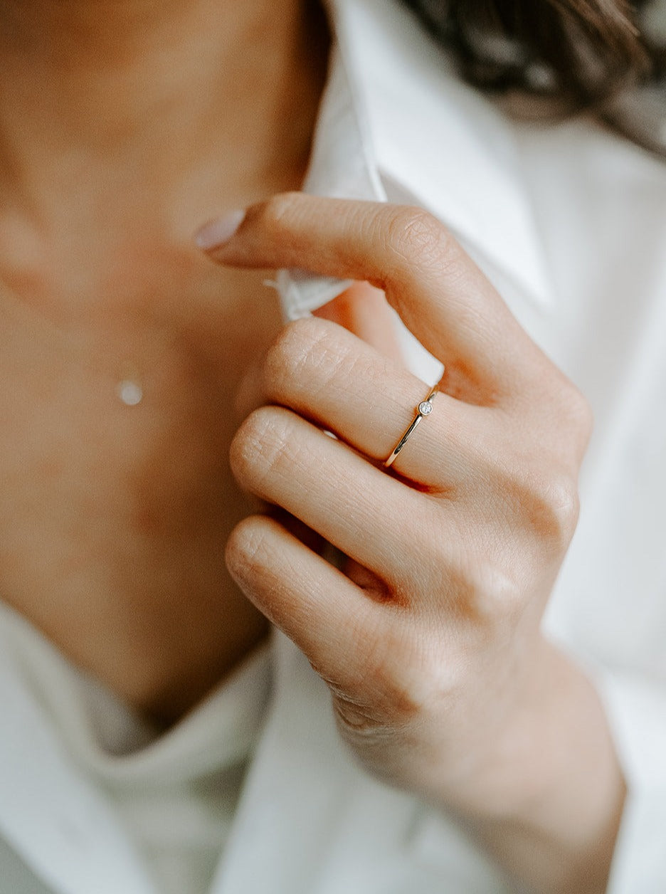 14k yellow gold, bezel, lab diamond, solitaire, stacking ring, front view, worn on hand