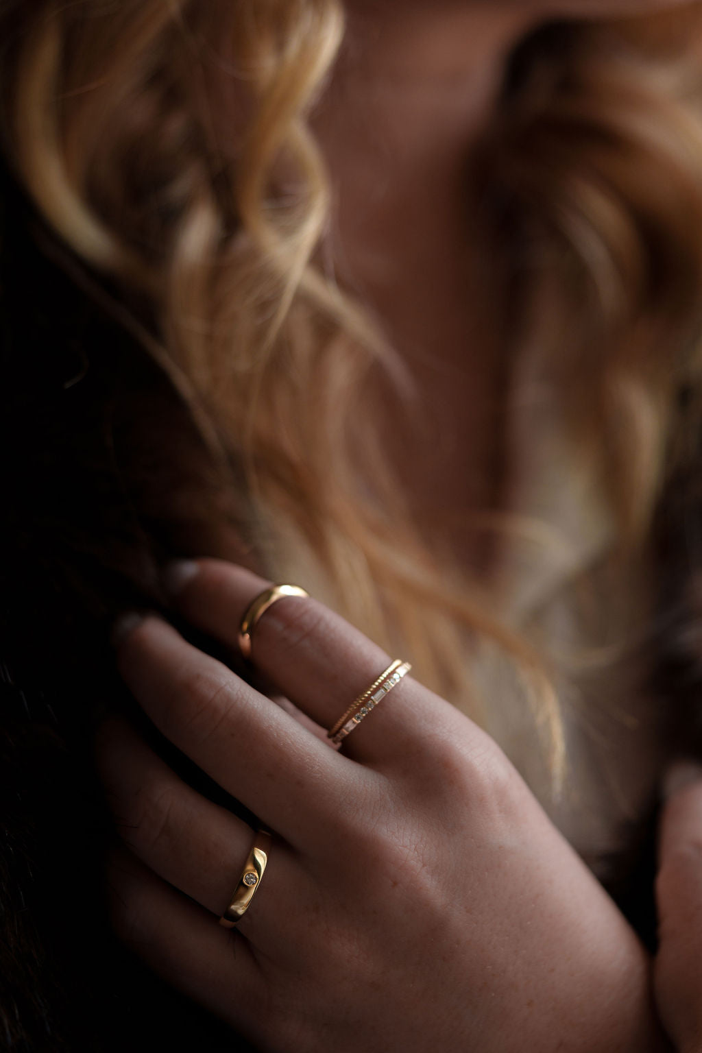 14k yellow gold, baguette and round lab diamond ring worn on hand, front view
