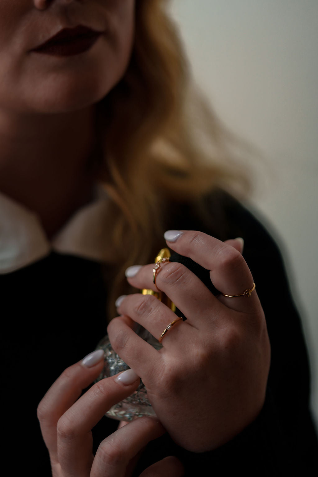 yellow gold baguette diamond ring being worn on hand, front view