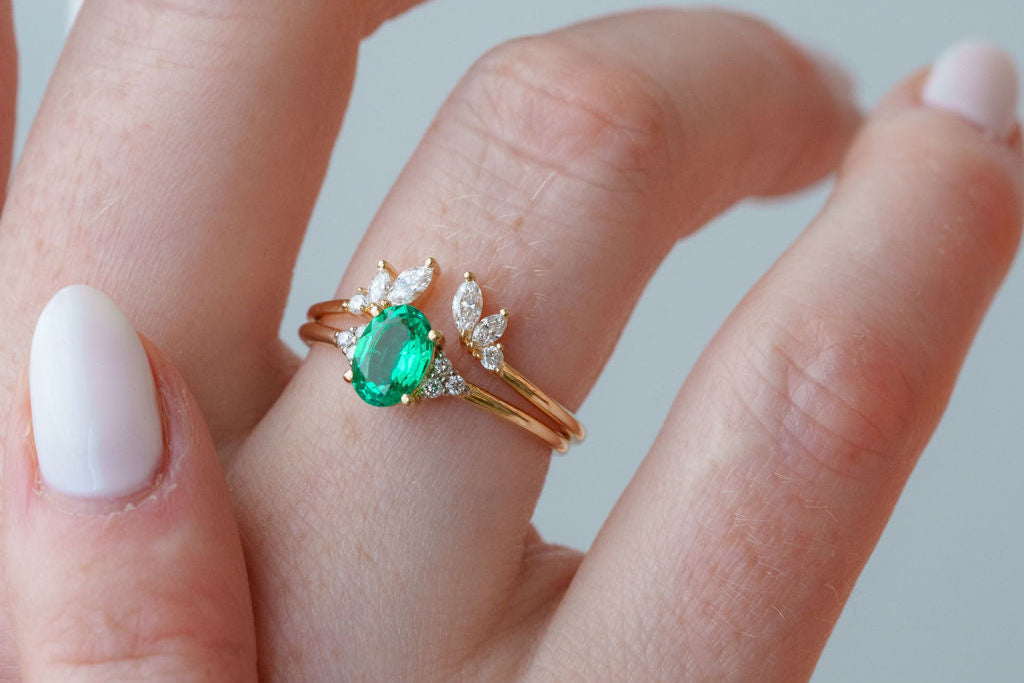 Oval Emerald With Accent Diamonds Ring