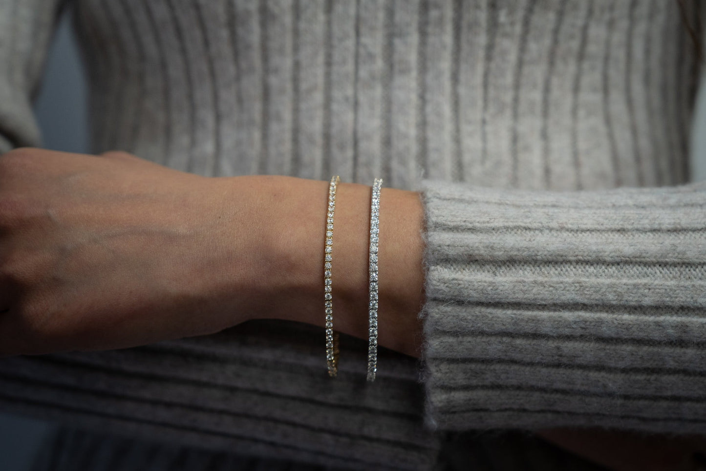 4 carat yellow and white gold diamond tennis bracelets being worn