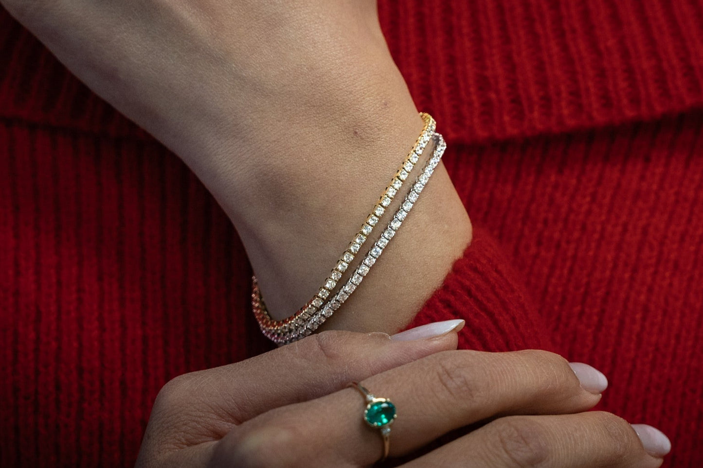 3 carat white and yellow gold diamond tennis bracelet being worn on wrist side angle view