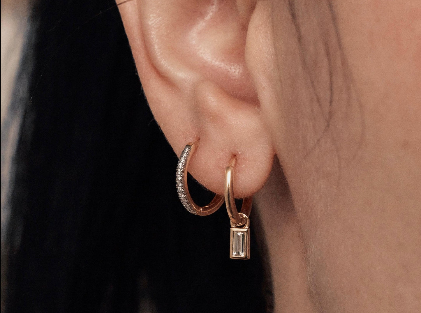 14k yellow gold, baguette lab diamond earring charms worn on ear, side view