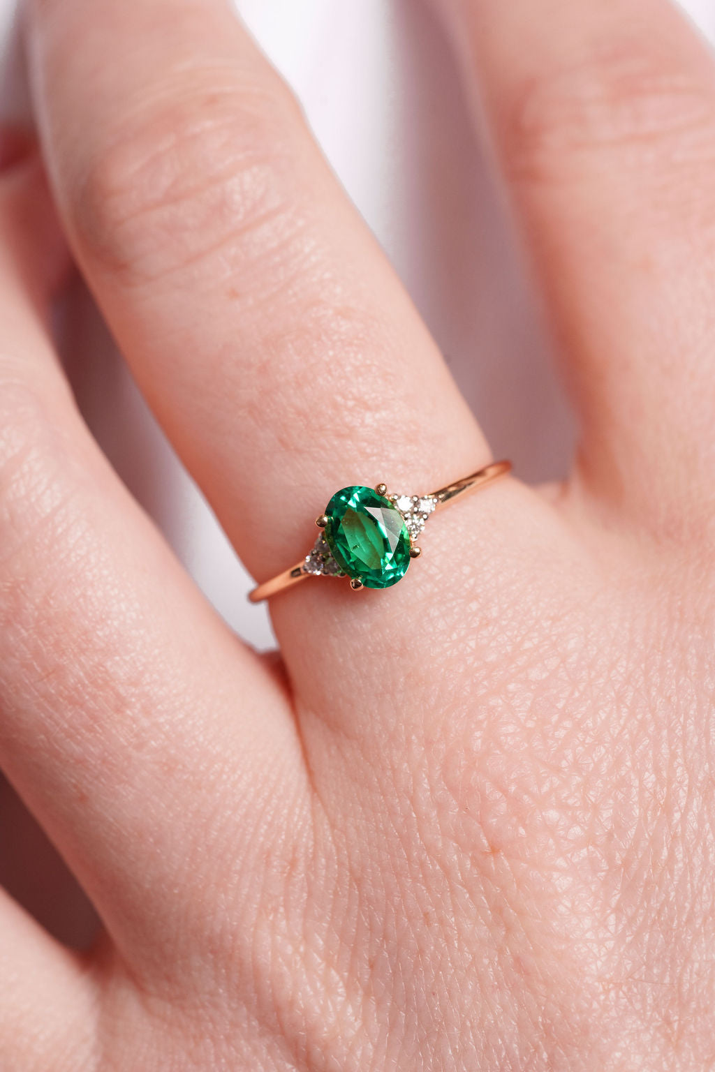 Oval Emerald With Accent Diamonds Ring