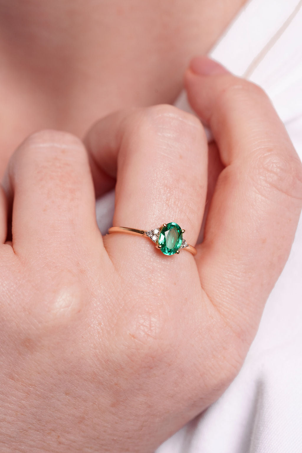 Oval Emerald With Accent Diamonds Ring