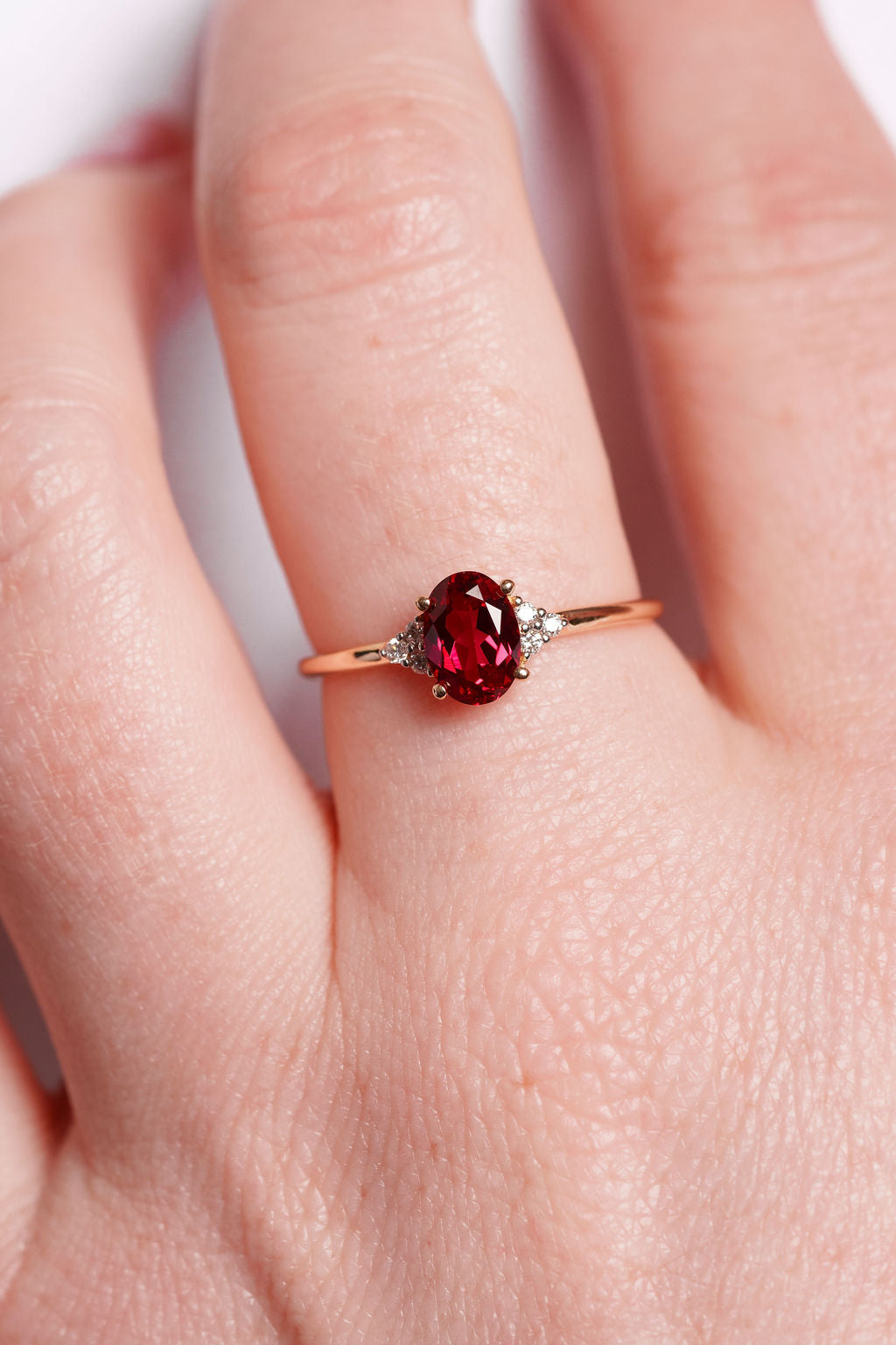 Oval Ruby With Accent Diamonds Ring