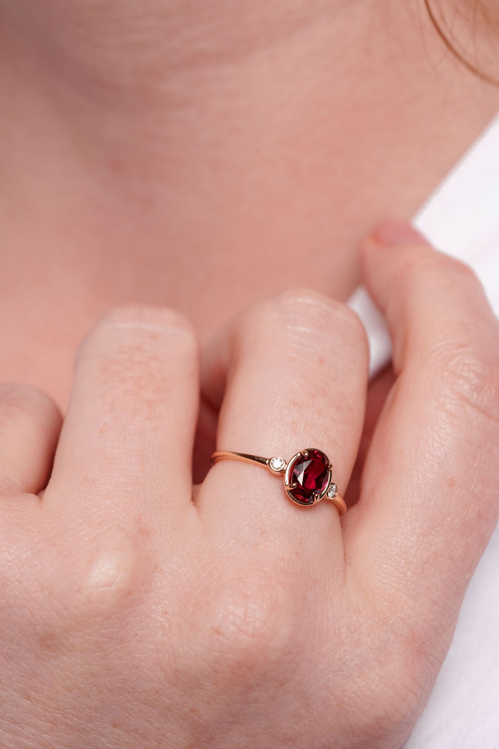 Bezel Inspired Oval Ruby and Diamond Ring